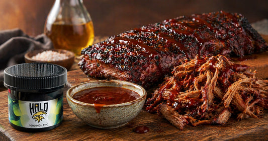 THC BBQ drizzle sauce made with Halo Drink Mix next to smoked ribs